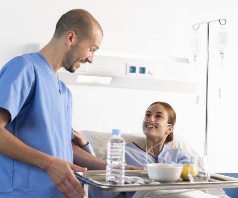 CarePortal-medium-shot-nurse-holding-food-tray